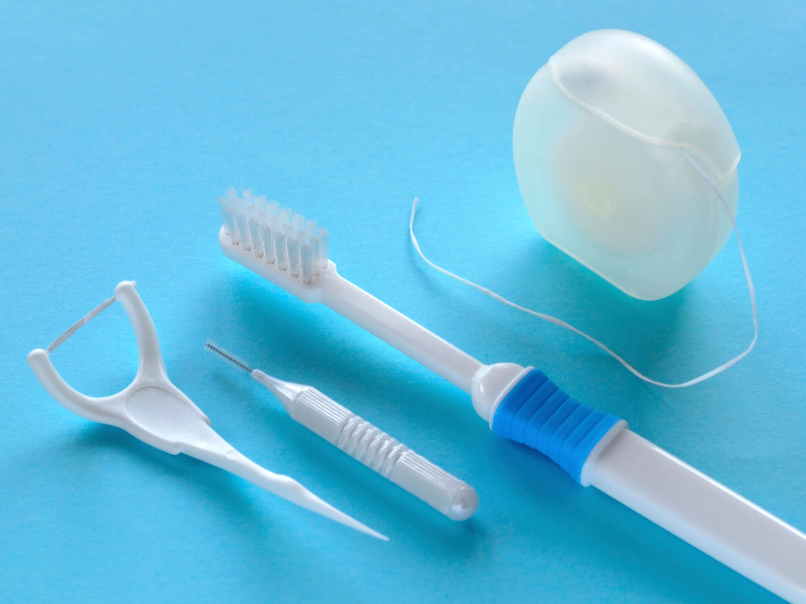 Fio dentário – antes ou depois da escovagem?